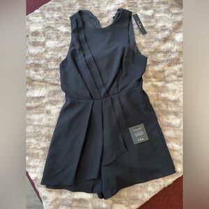 Lulu's Black Sleeveless V-Neck Pleated Romper